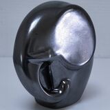 Two iridescent black and white ceramic elephants design