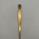 Gold plated letter opener.