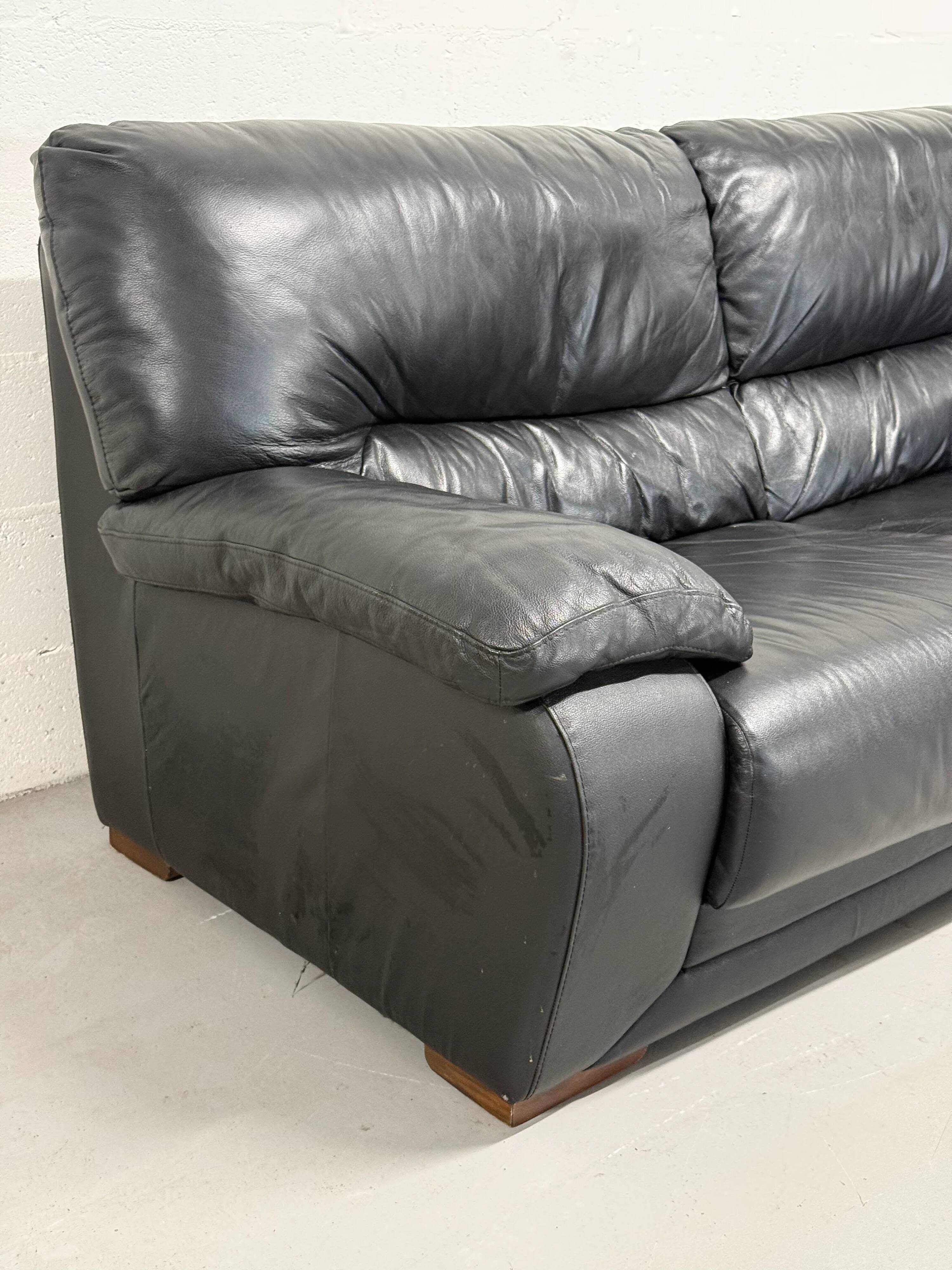 Black leather sofa — Italian postmodern design