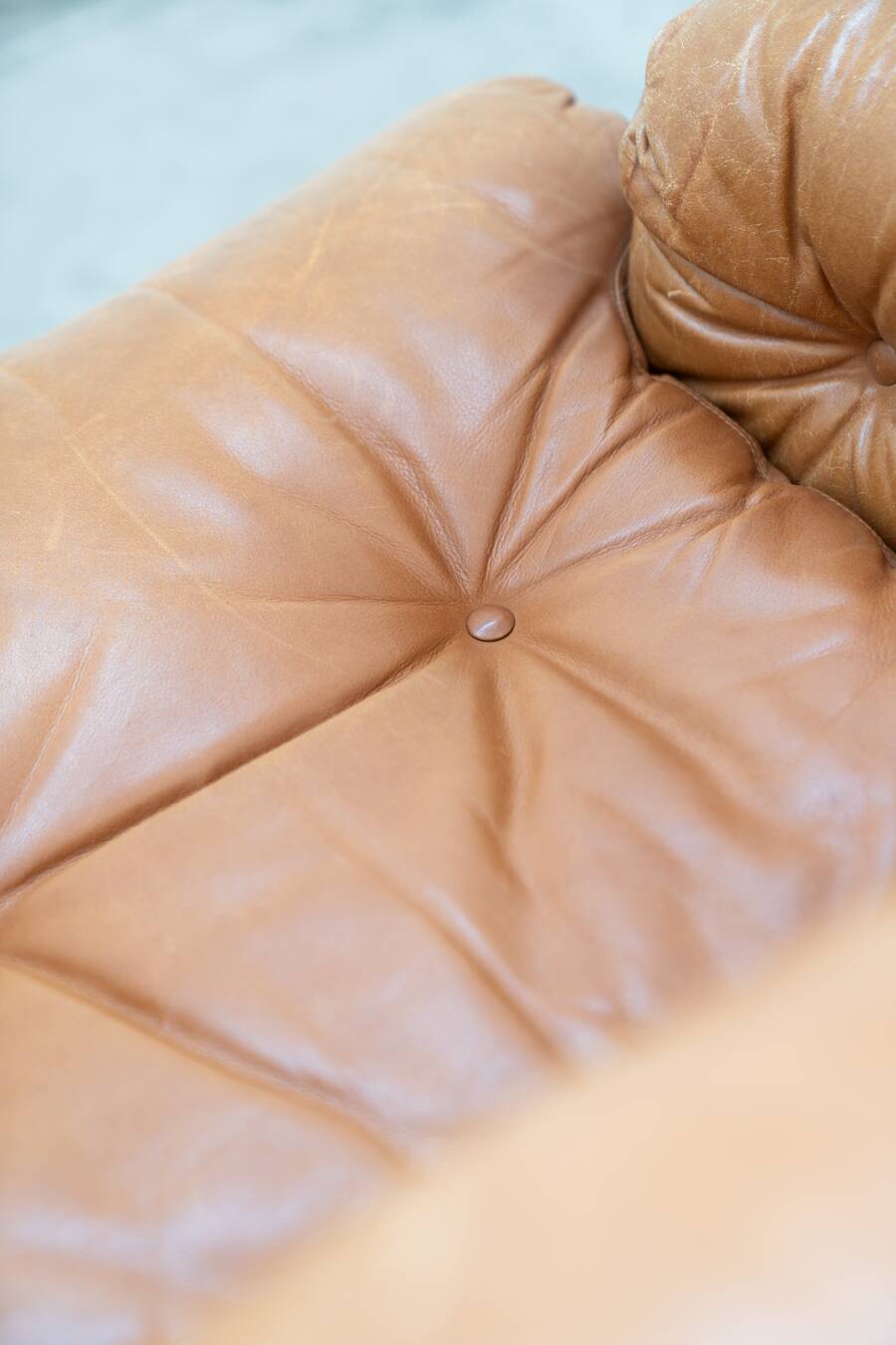 Pair of armchairs with cognac-colored pouf, "Coronado" model by Afra & Tobia scarpa for B&B It