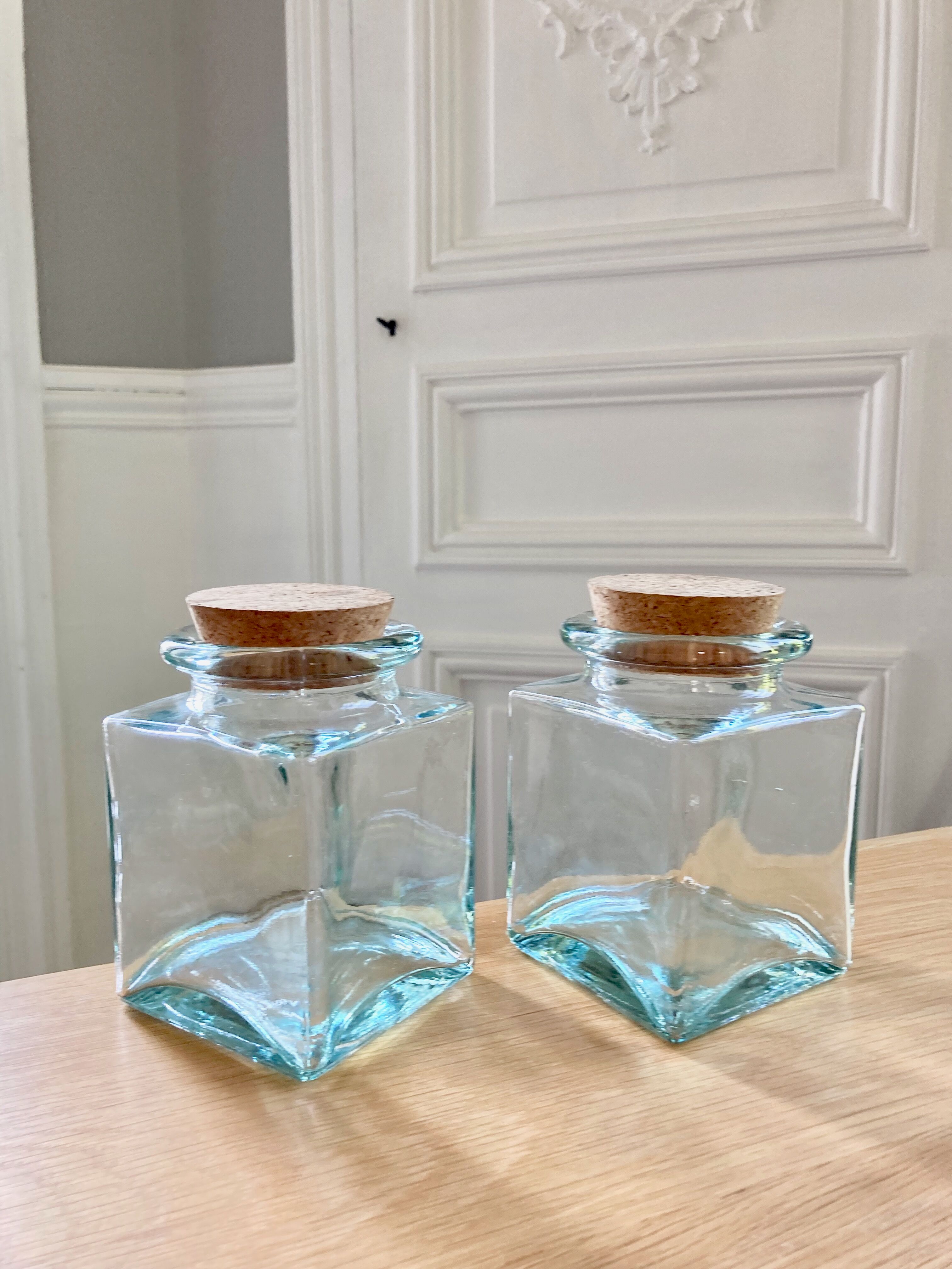 Pair of square jars in tinted glass and corks