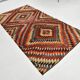 Tapis Kilim vintage géométrique rouge et vert