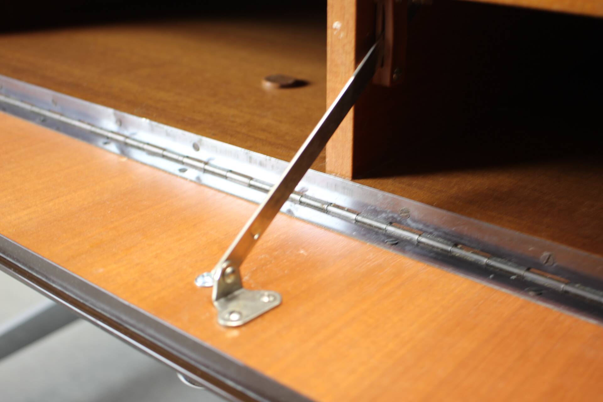 Restored Danish teak rolling media console, 1970s.