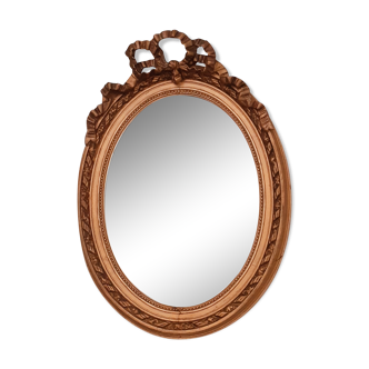 Miroir doré ovale, à noeud , 55 x 40 cm