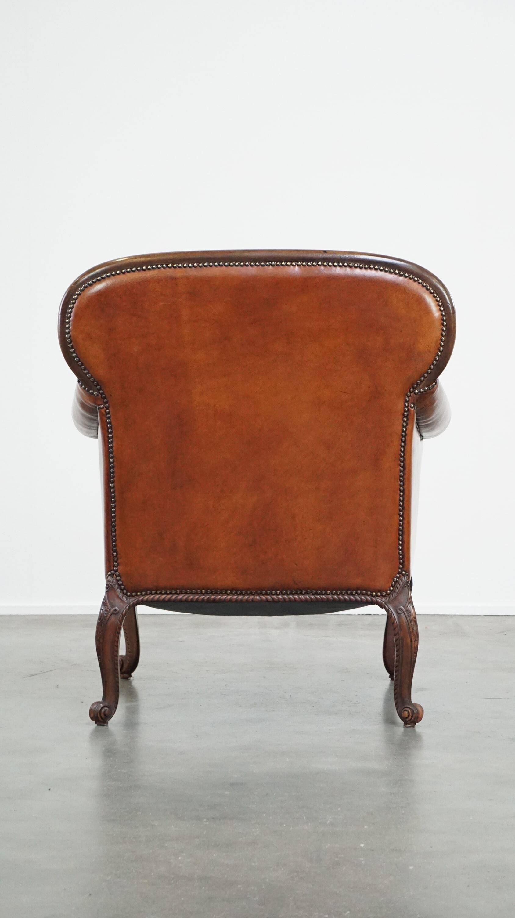 Fully restored antique sheepskin armchair
