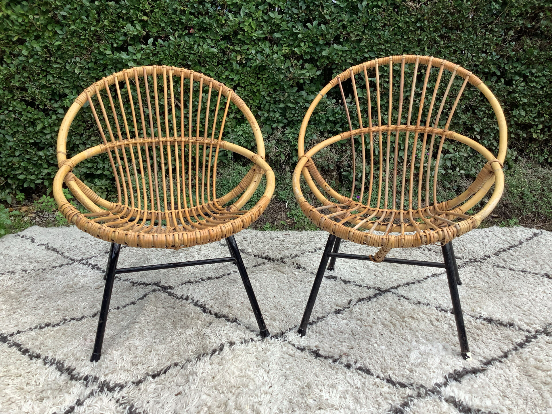 Pair of children's armchairs in rattan from the 1960s.
