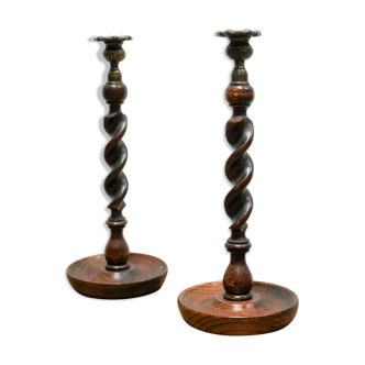 Pair of antique candle holders in wood and bronze