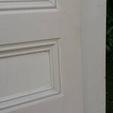 Pair of cupboard doors and old woodwork frame