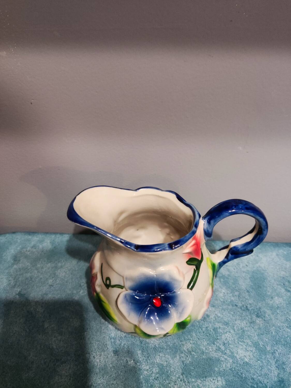 Earthenware milk jug