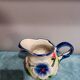 Earthenware milk jug