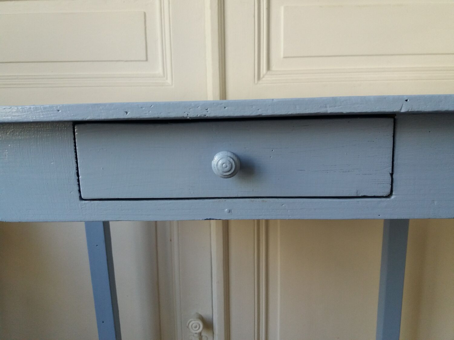 Lavender blue wooden desk with drawers