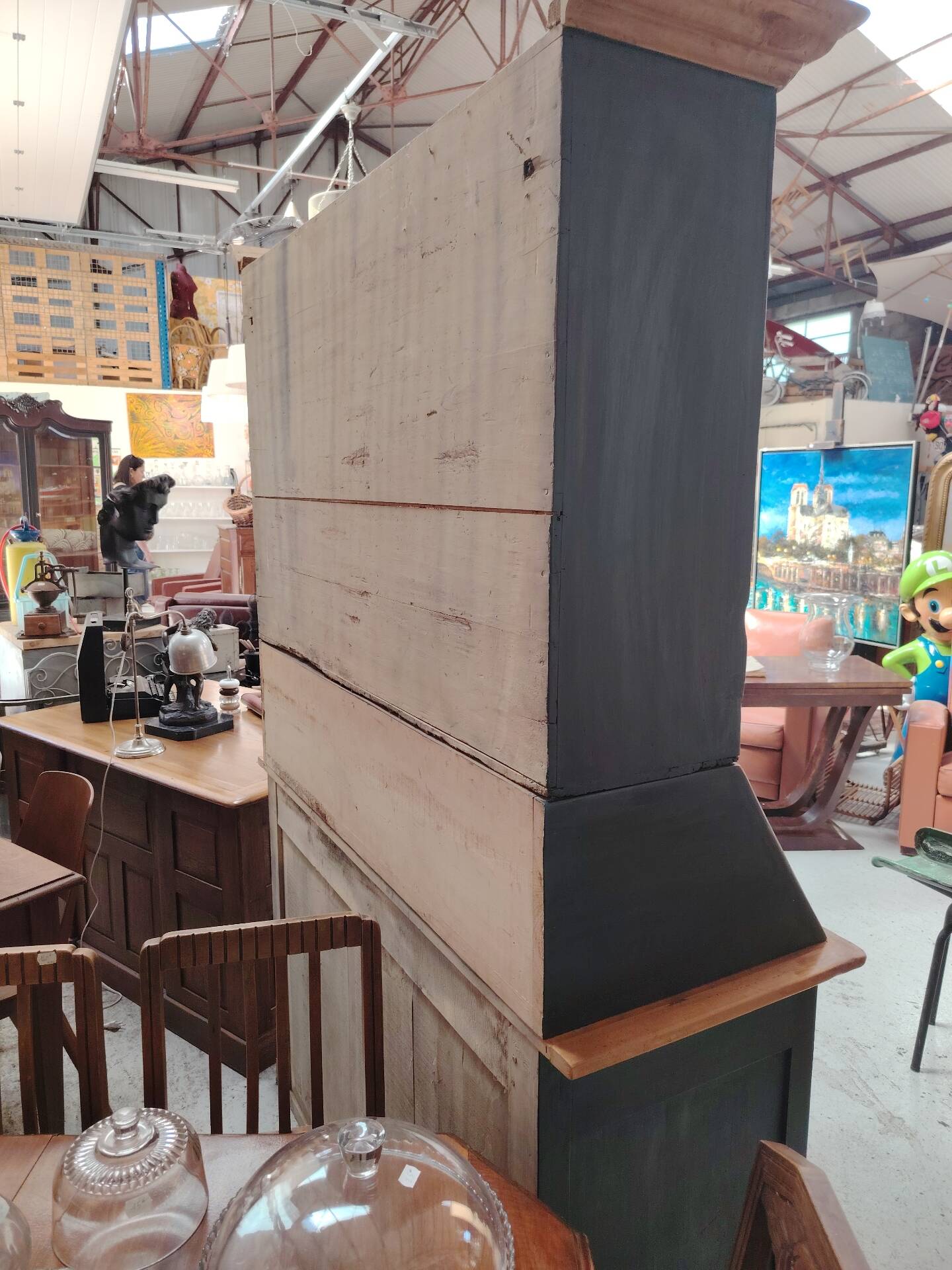 Large two-body grain merchant cabinet made of solid wood.