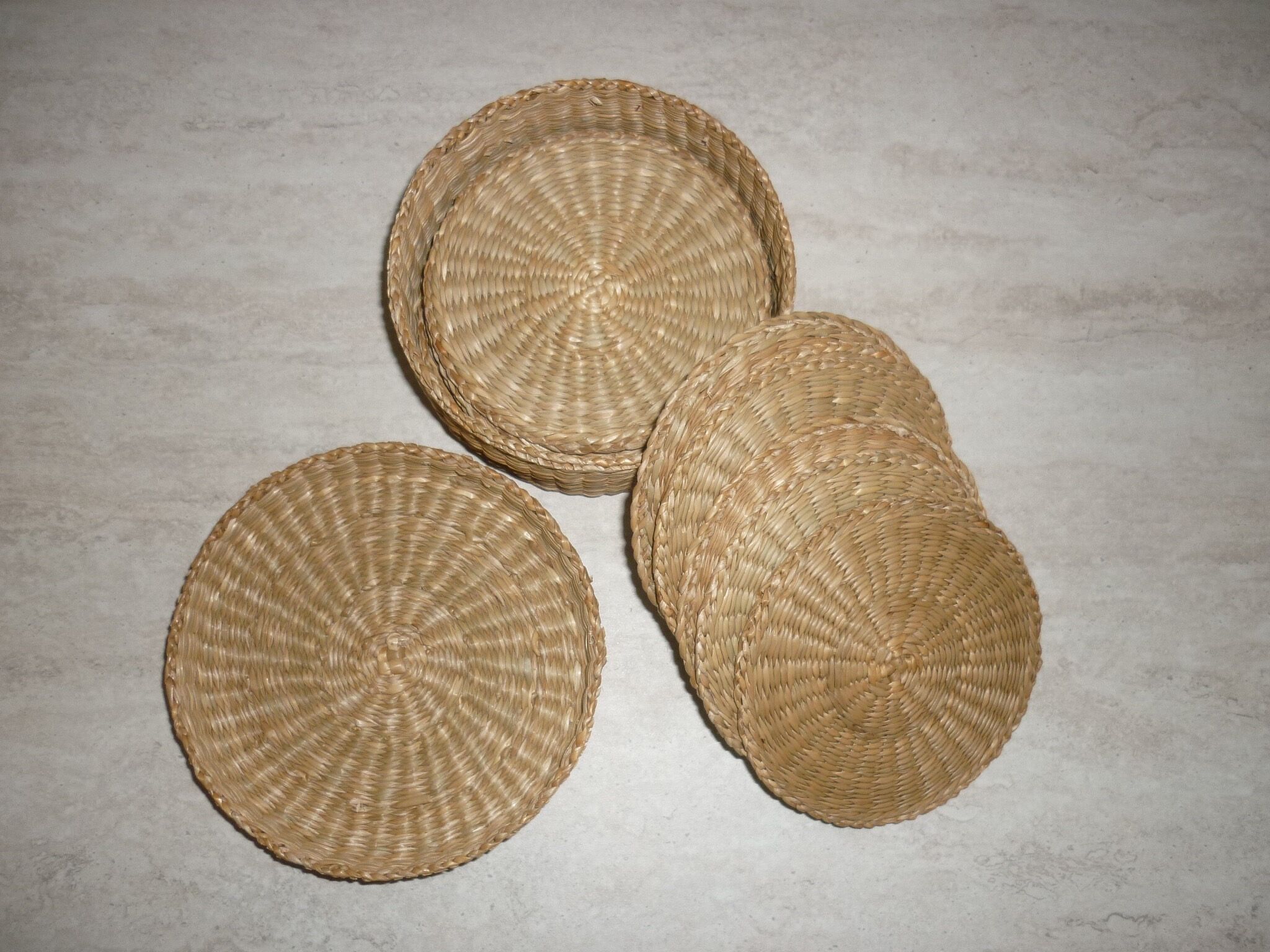 12 coasters in their wicker box