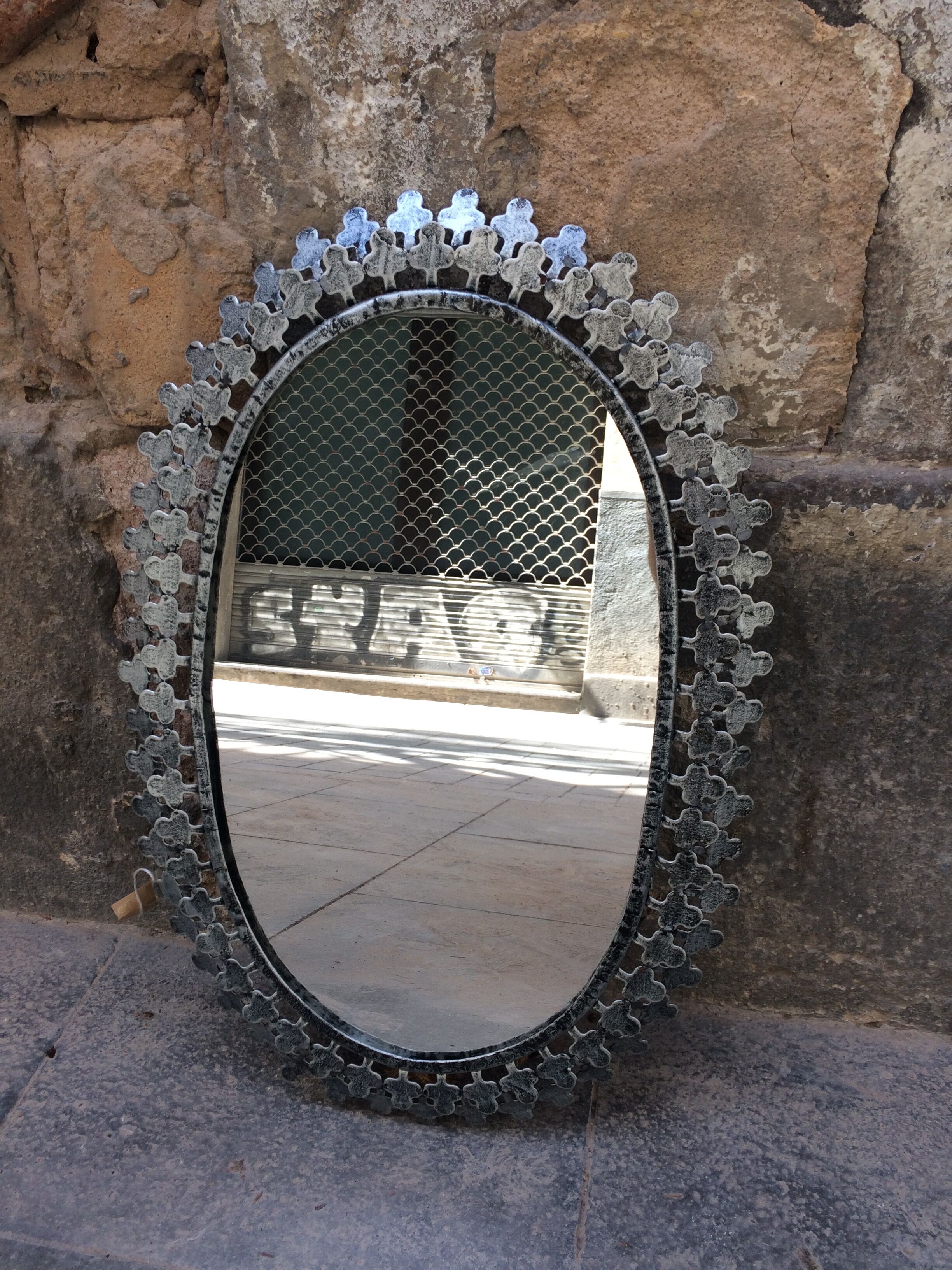 Metal oval mirror