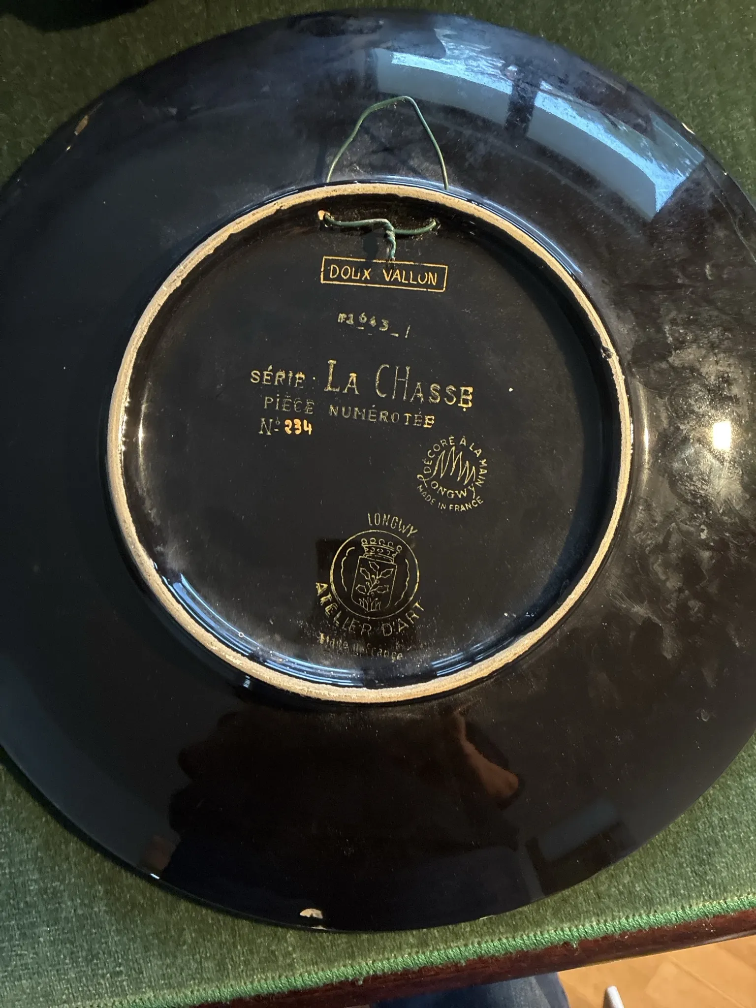 Plate from the Longwy Art workshop, numbered and signed L.Valenti.