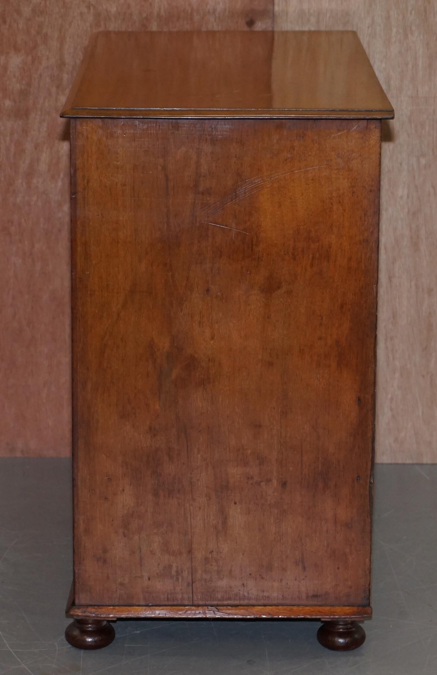 Victorian military commode in patinated walnut.