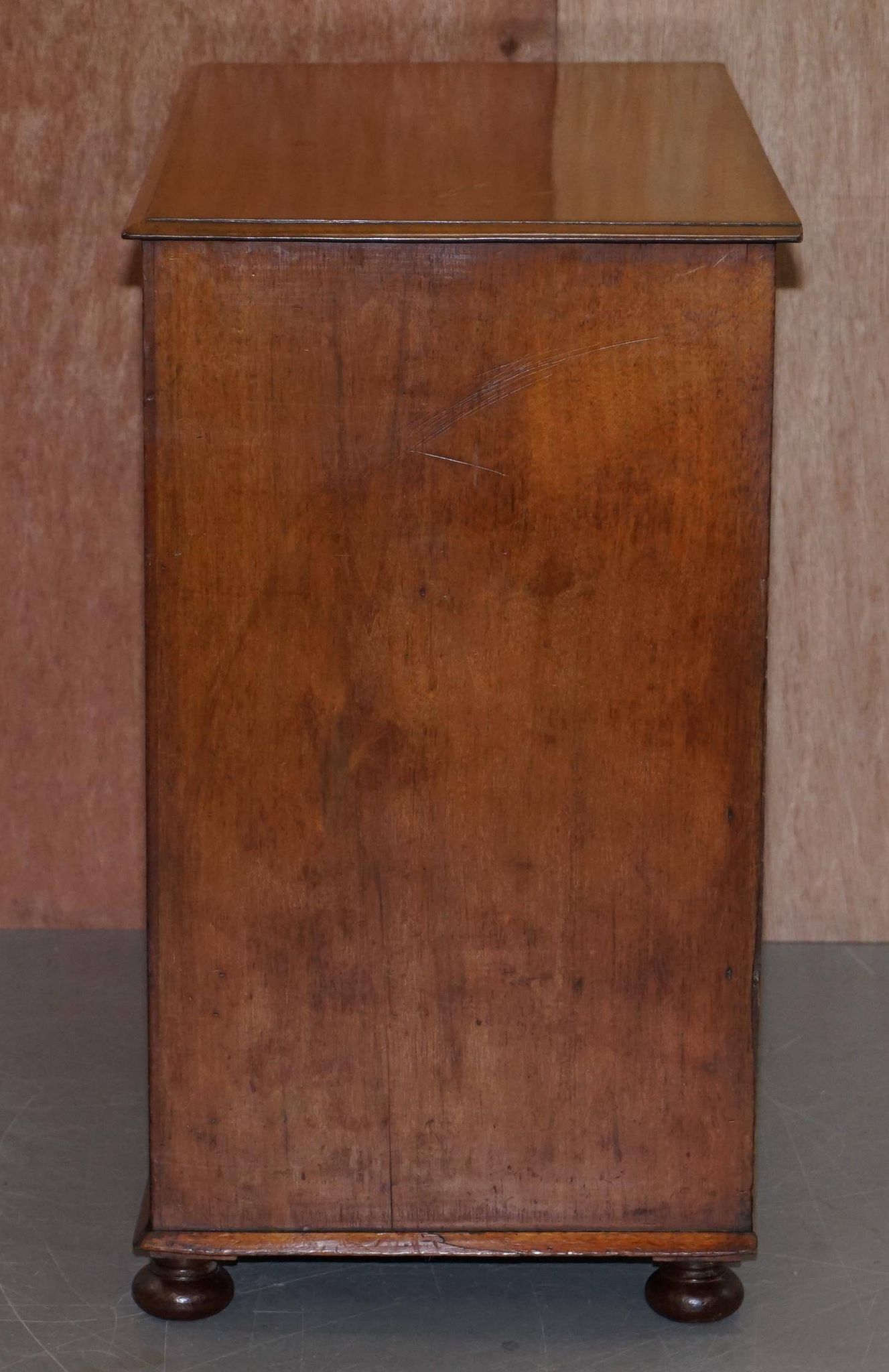 Victorian military commode in patinated walnut.