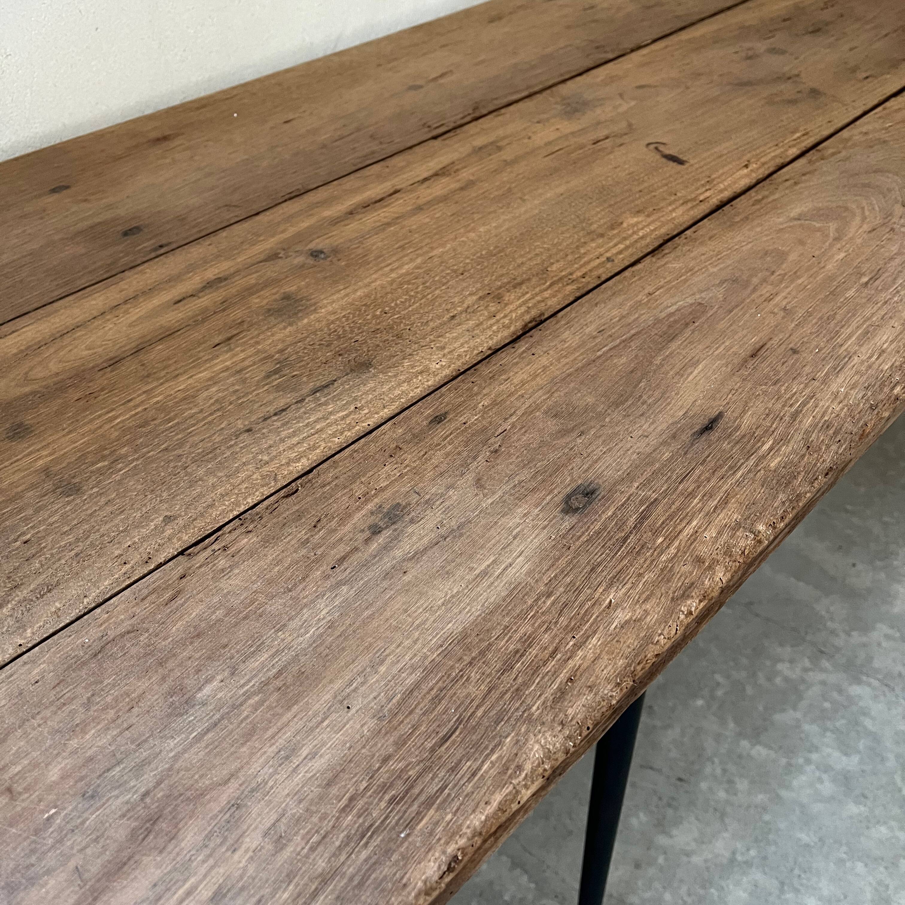 Wooden table, black metal legs