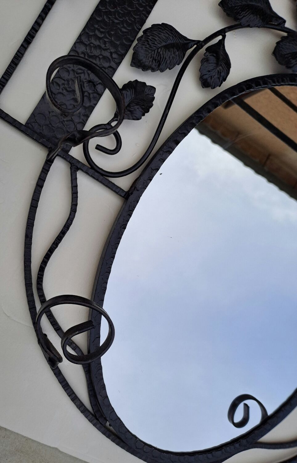 Wrought iron wall coat rack