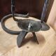 Set of 3 candlesticks and a candle holder in wrought iron.