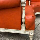 Pair of neoclassical bergère armchairs by Maison Jansen circa 1950.