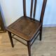 Pair of 1930s bistro chairs with patinated wood.