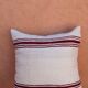 burgundy and white striped cushion in handmade wool
