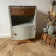 Pair of mismatched art deco bedside tables in green and wood