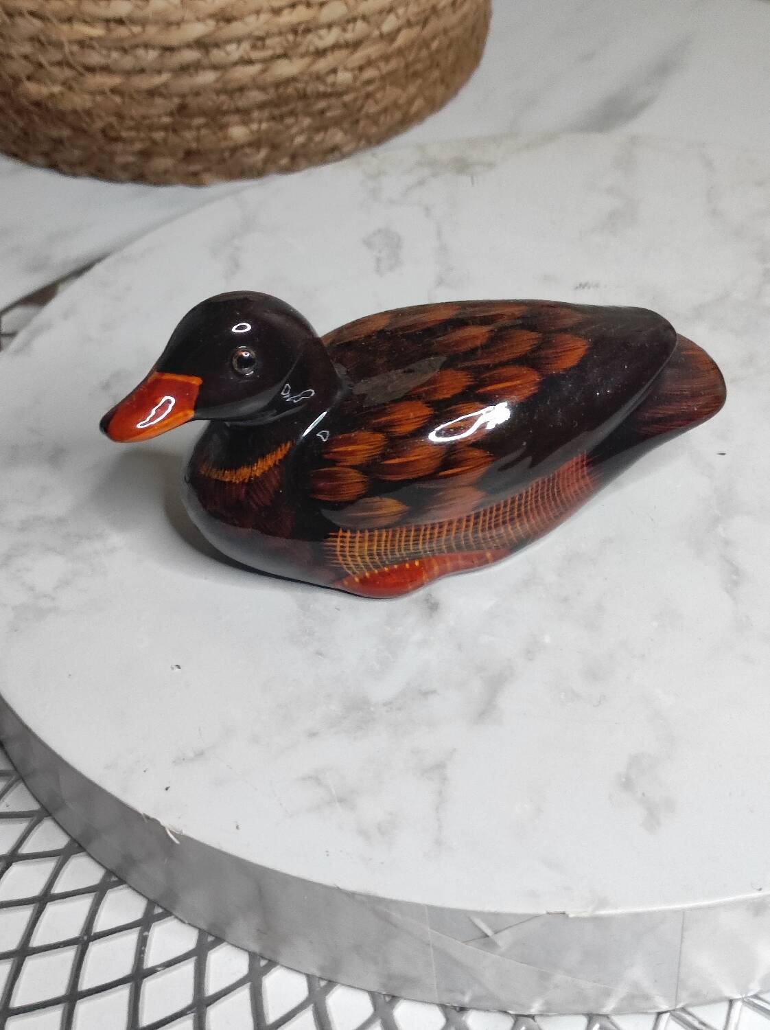Antique duck figurine
