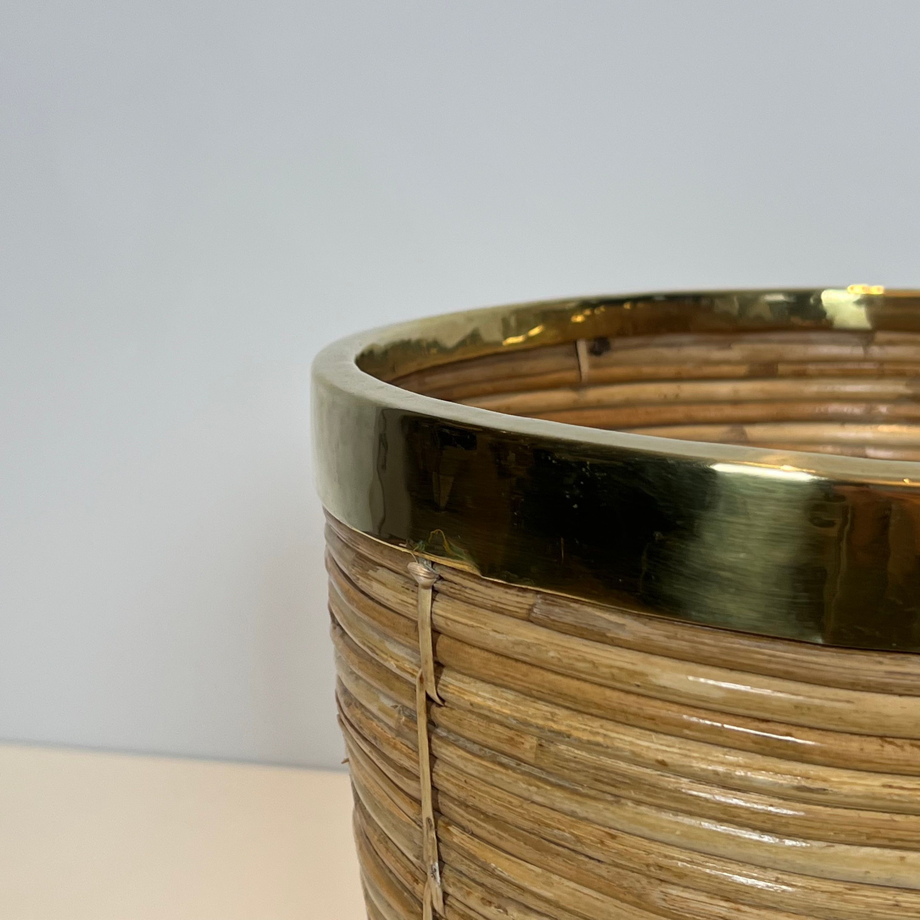 Rattan and brass wastepaper basket in the style of Gabriela Crespi.