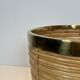 Rattan and brass wastepaper basket in the style of Gabriela Crespi.