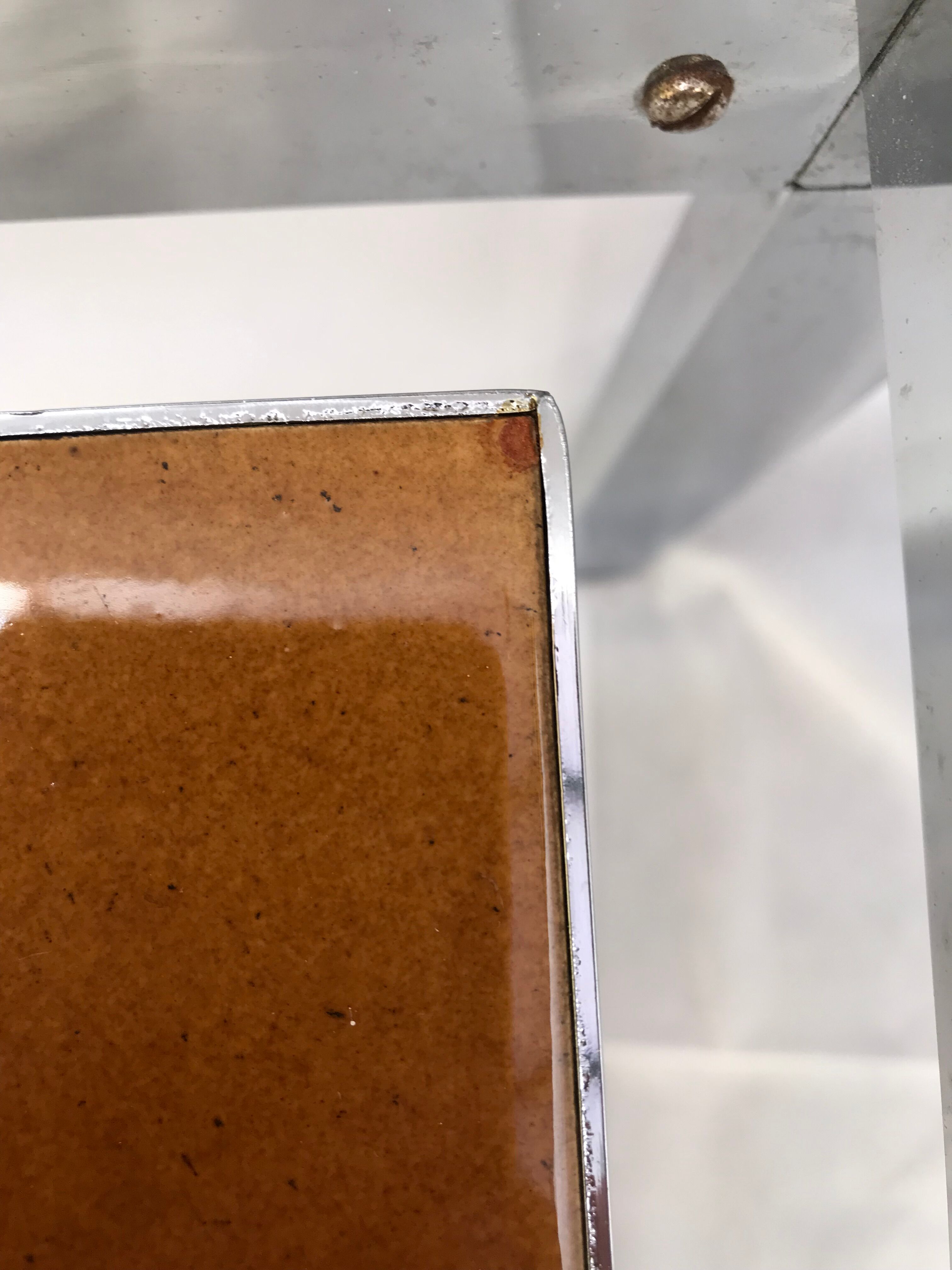 Metal and ceramic earthenware coffee table