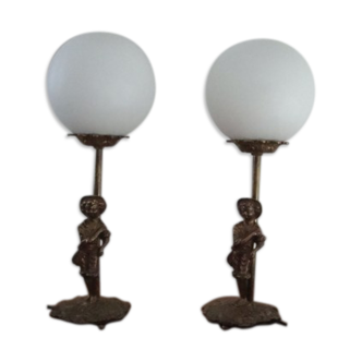 Paire de lampes art deco en bronze doré
