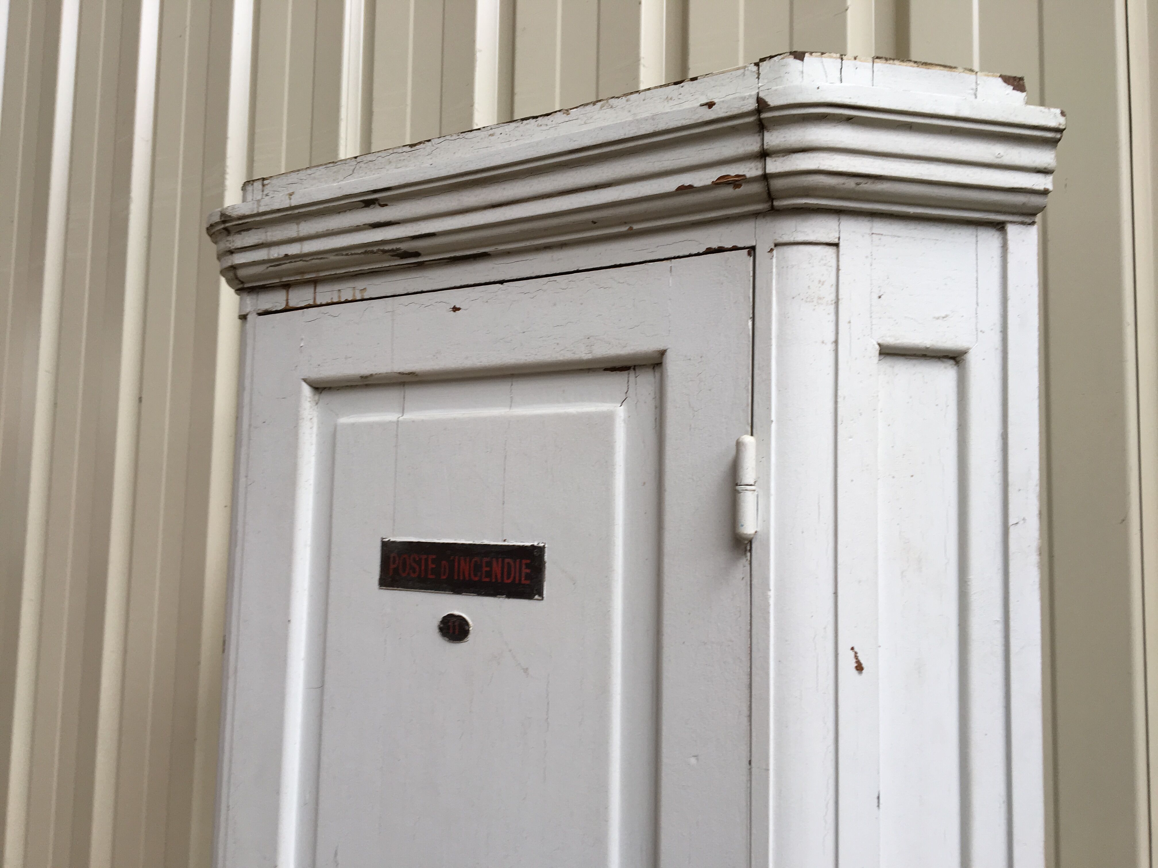 fire post cabinet of the old French bank in oak