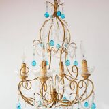Italian chandelier in gold metal and blue crystal drops