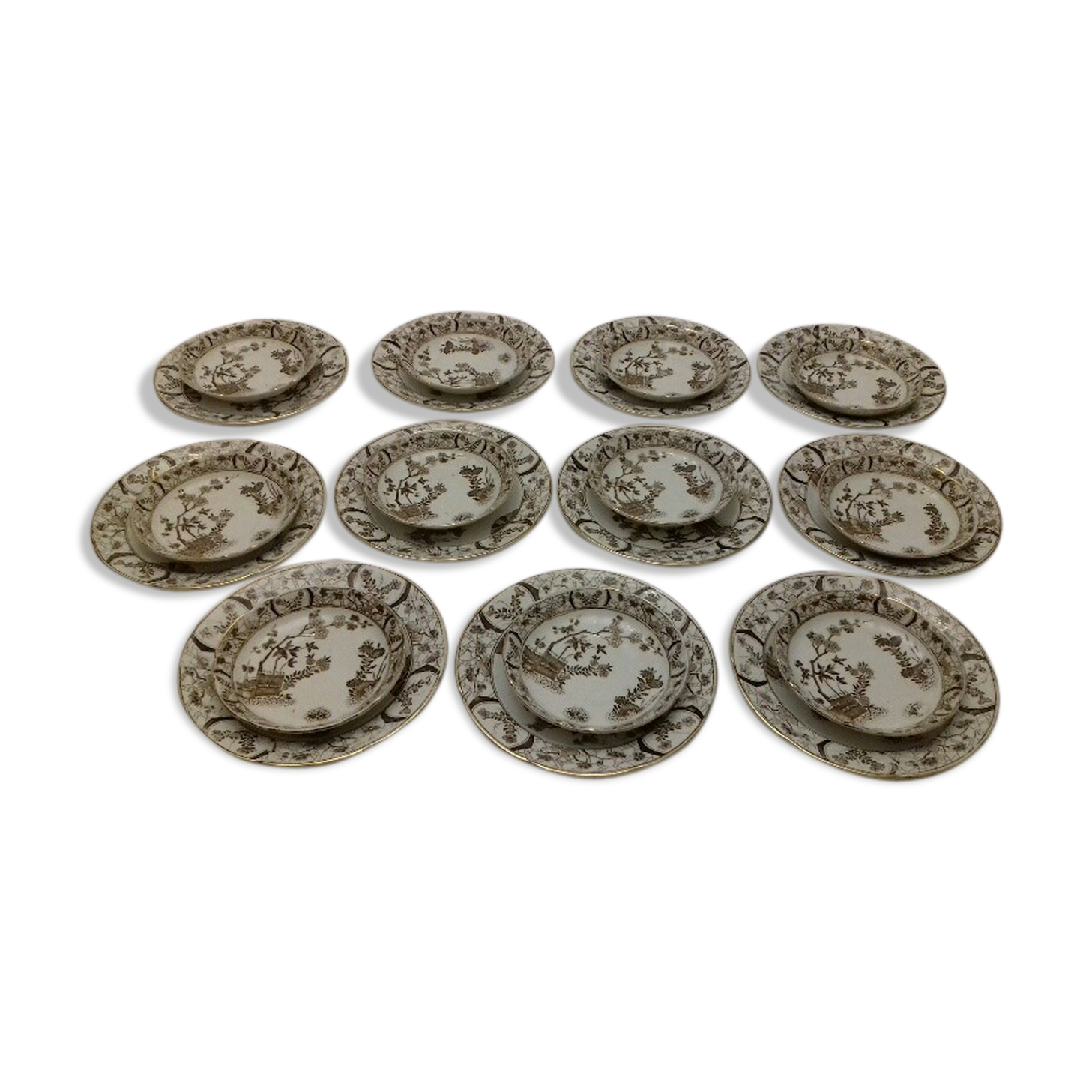 Set of 11 plates and 11 earthenware cups