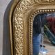 Old Louis Philippe style mirror in gilded wood with pediment