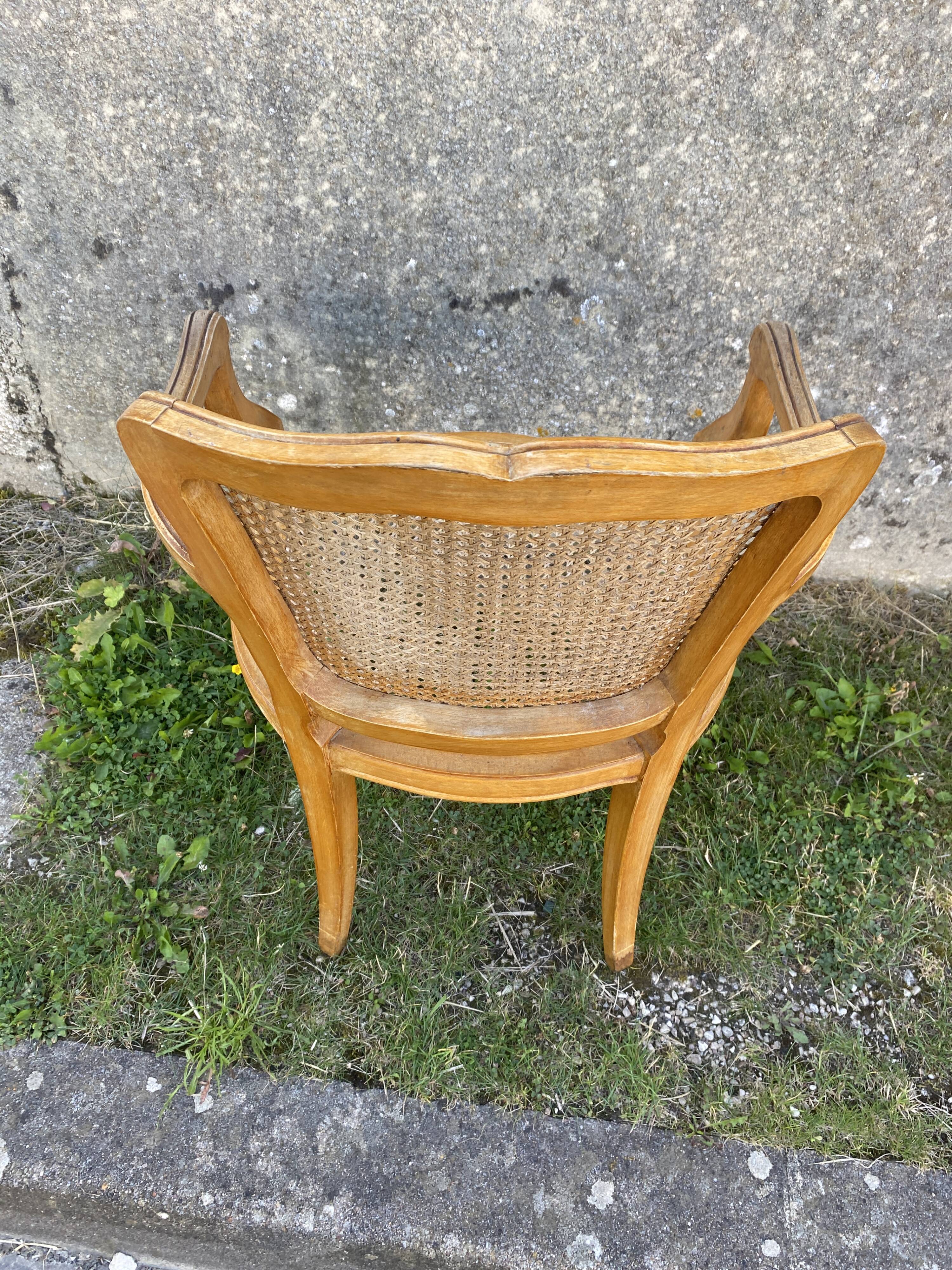 Cane armchair