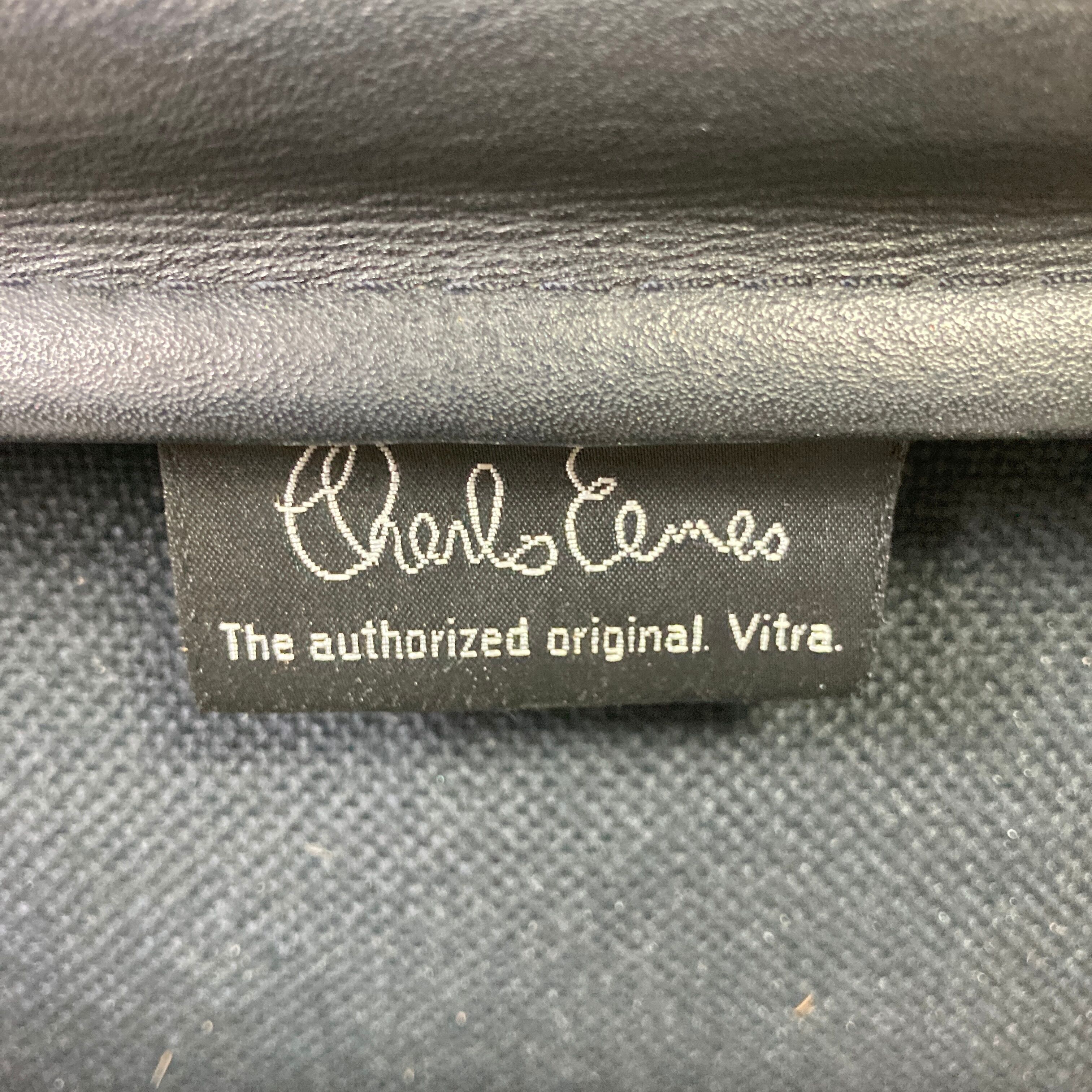 Eames black leather Soft Pad Group chair made by Vitra for Herman Miller