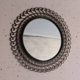 Large round vintage mirror in black metal with green patina