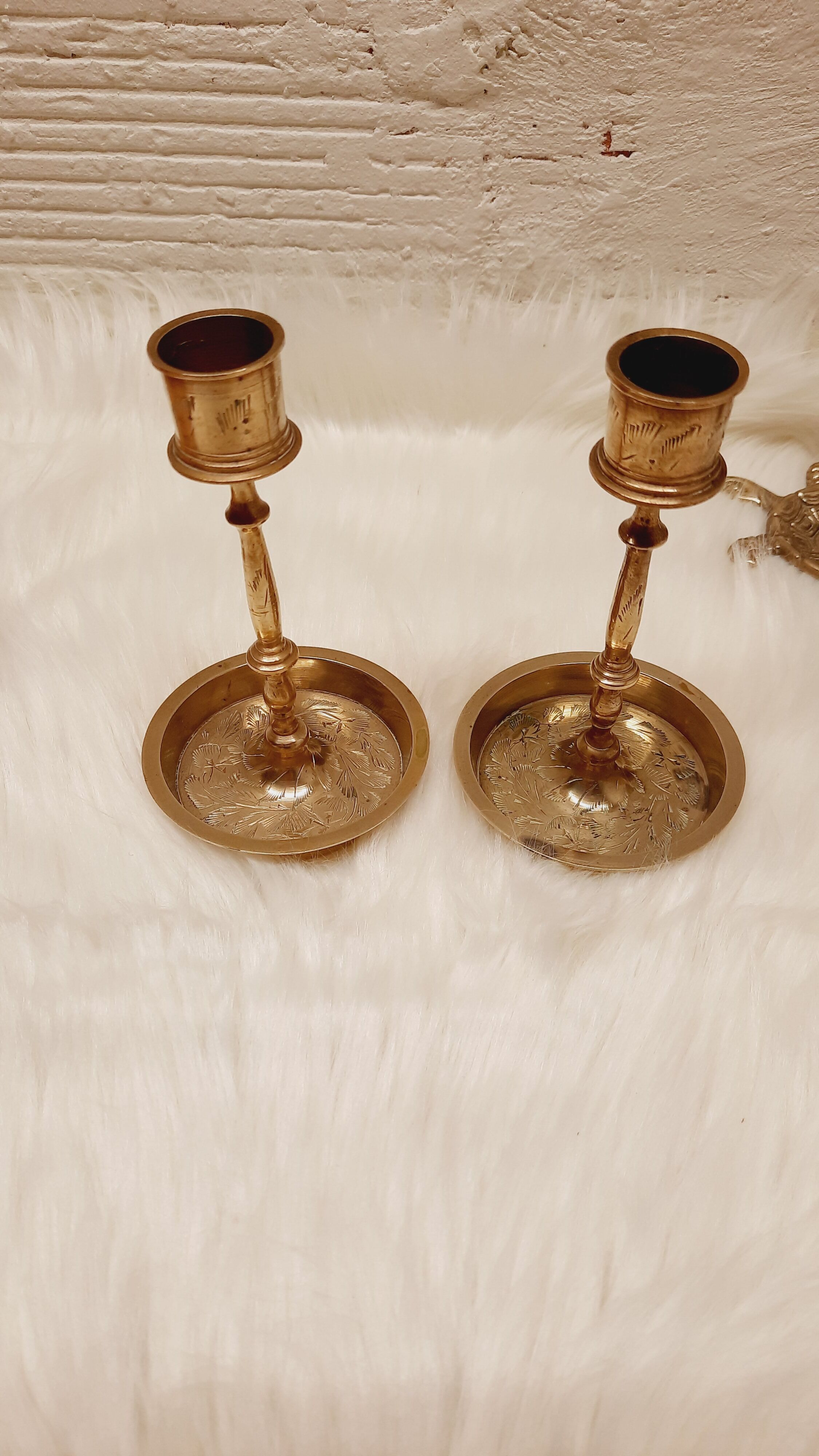 Pair chiseled brass candlesticks