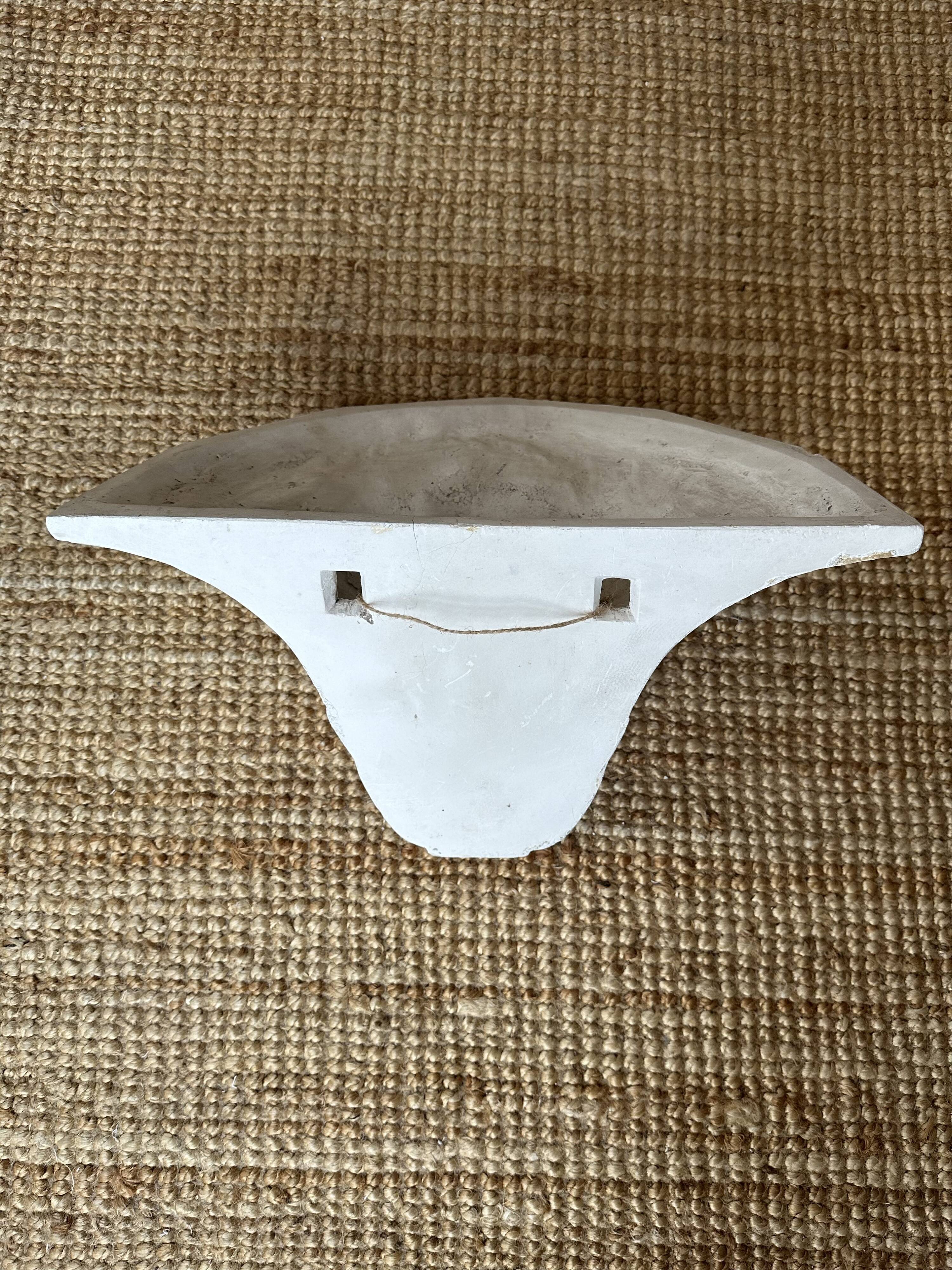 Pair of plaster wall sconces, palmette decoration, 20th century