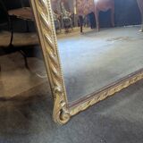 Very large Louis XVI style mirror in wood and gilded stucco with gold leaf