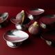 Lot of 6 vintage stainless steel bowls, 1970s, egg-shaped design.