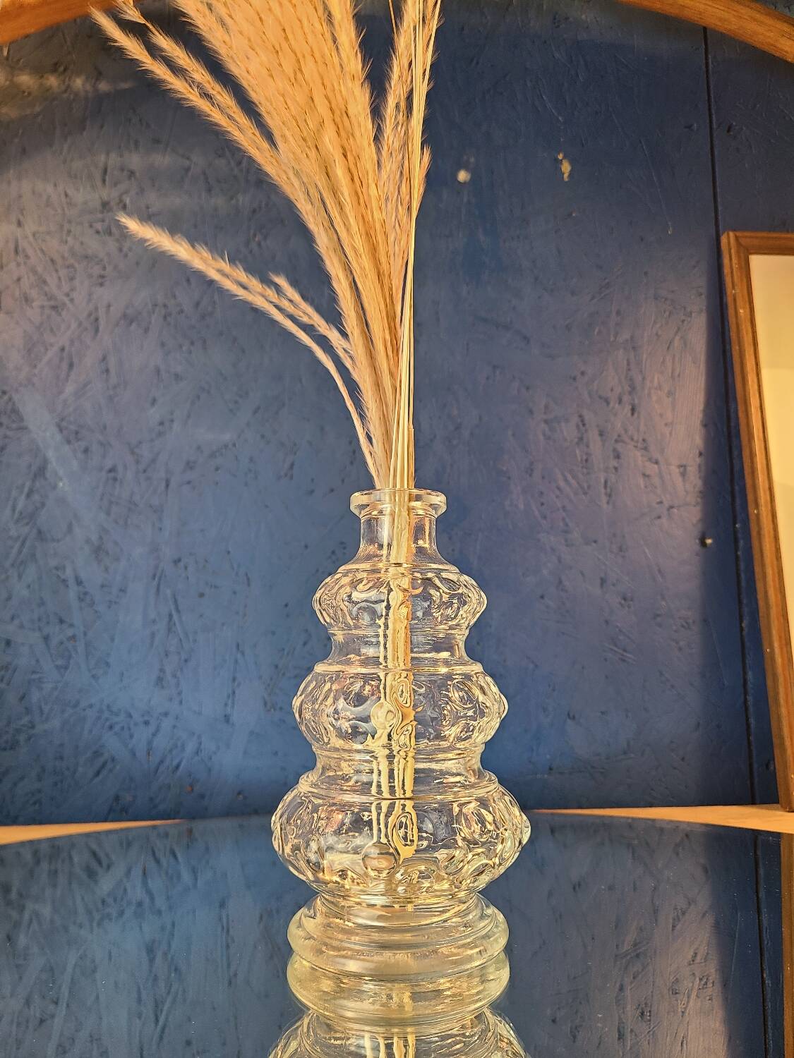 Old 3-branched stone candlestick cut with fine engravings