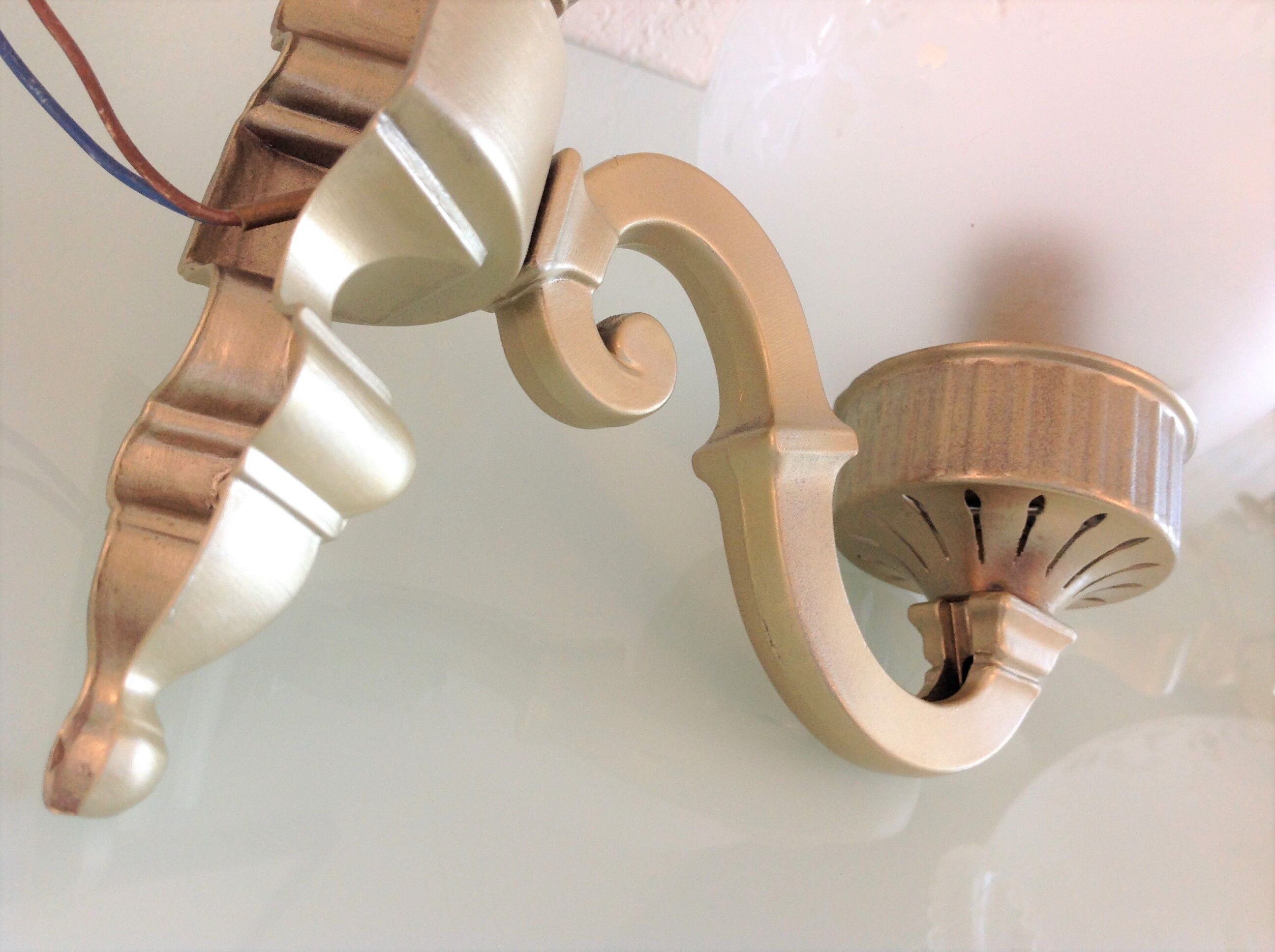 Pair of wall lamps in gilded metal and frosted glass art deco style