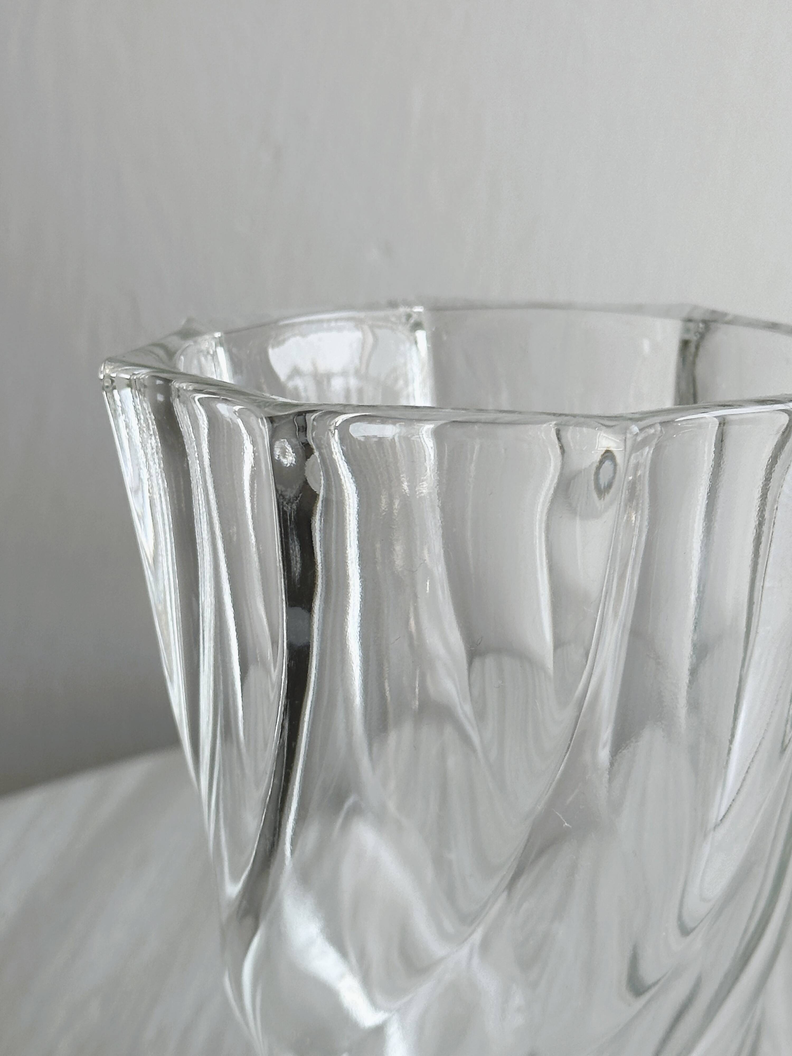 thick twisted glass vase.