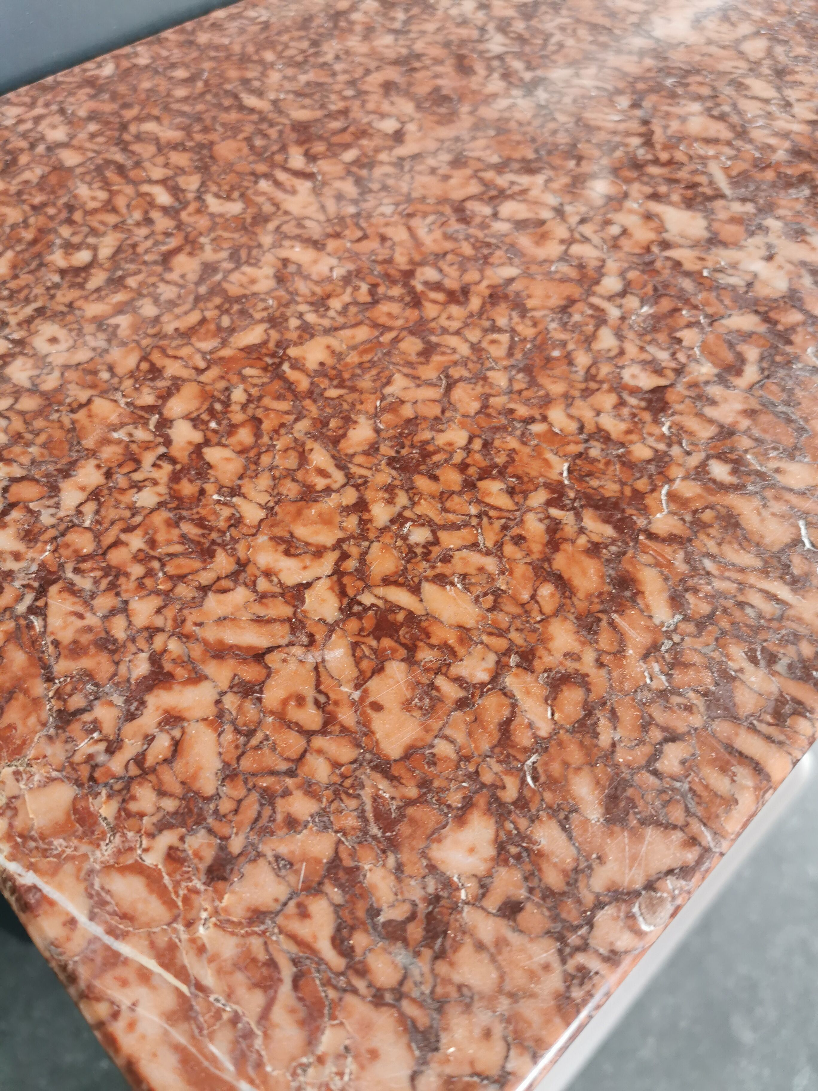 Old wooden and marble bedside