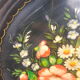 Black metal round top and vintage hand-painted flowers
