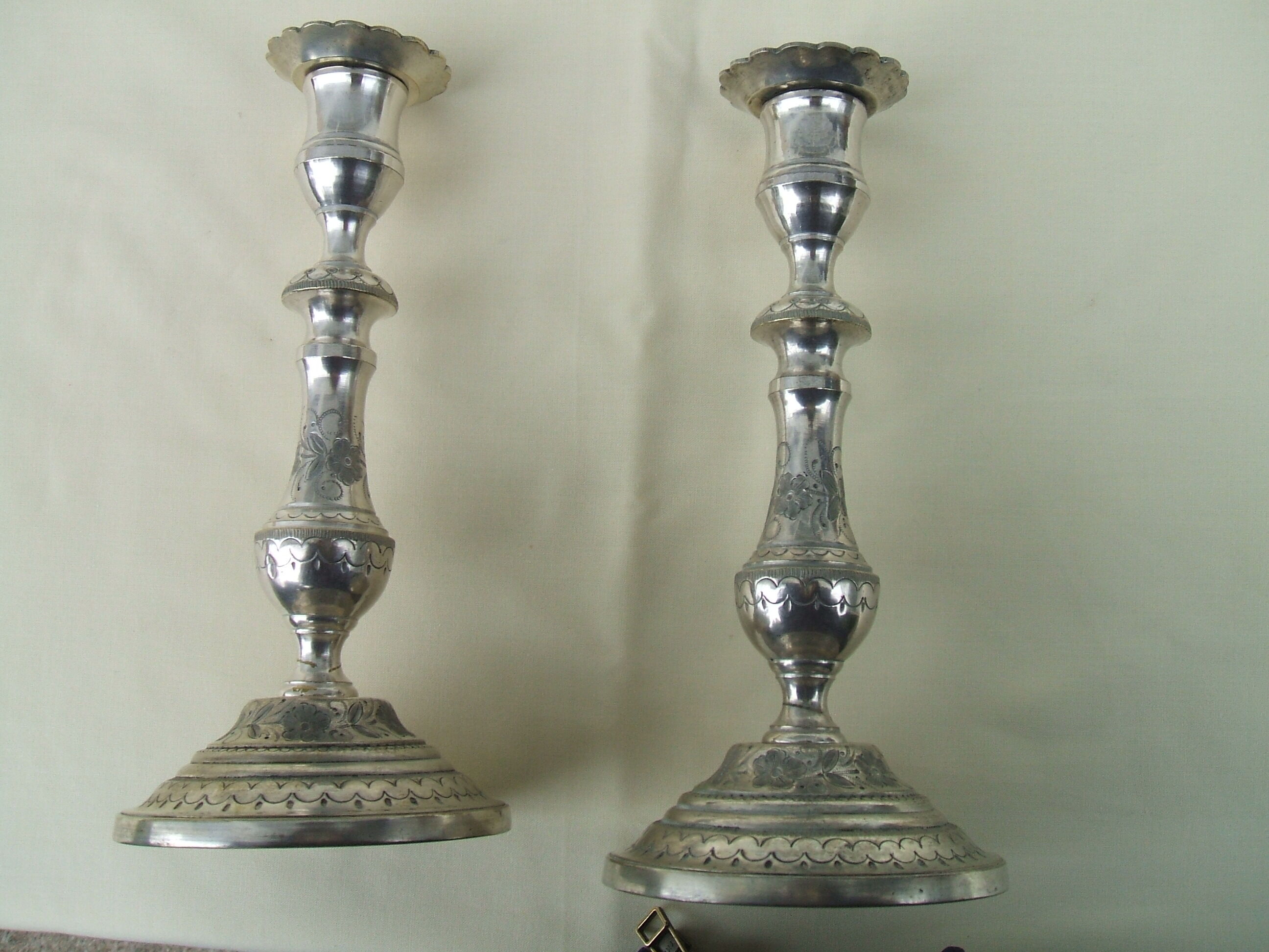 Pair of silver bronze candle holders